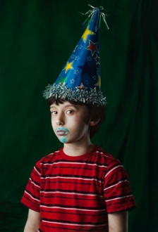Katie Miller, Youth in a Party Hat, 2013, oil on panel, 34 x 23 inches.