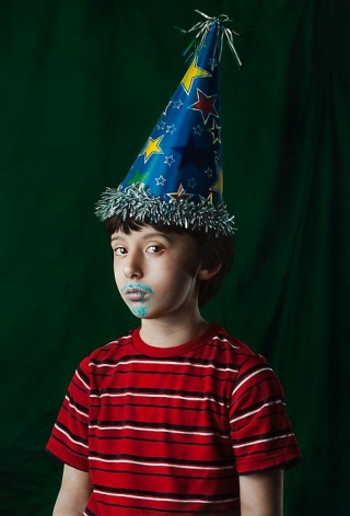 KATIE MILLER  Youth in a Party Hat 2013, oil on panel, 34 x 23 inches.