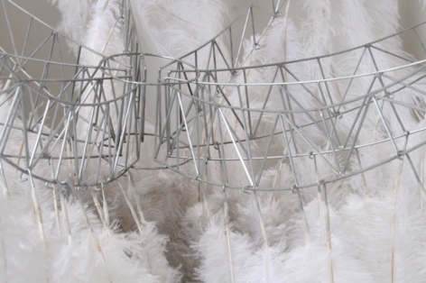 MEG MITCHELL Embodied Transcendence / Blast-off (in miniature) 2008, steel wire, ostrich feathers, 48 x 48 inches.