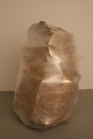 BRIAN SYKES Boulder 2006, saran wrap, wood and straw bale, 24 x 24 x 40 inches.